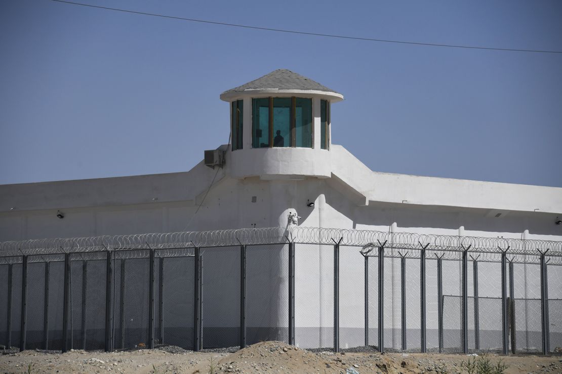 This May 2019 photo shows a watchtower at a high-security facility near what is believed to be a re-education camp where mostly Muslim ethnic minorities are detained, on the outskirts of Hotan, in China's northwestern Xinjiang region.