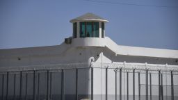 TOPSHOT - This photo taken on May 31, 2019 shows a watchtower on a high-security facility near what is believed to be a re-education camp where mostly Muslim ethnic minorities are detained, on the outskirts of Hotan, in China's northwestern Xinjiang region. - As many as one million ethnic Uighurs and other mostly Muslim minorities are believed to be held in a network of internment camps in Xinjiang, but China has not given any figures and describes the facilities as 