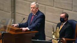 FILE - In this Jan. 27, 2021 file photo, Missouri Gov. Mike Parson delivers the State of the State address as Lt. Gov. Mike Kehoe, right, listens in Jefferson City, Mo. Parson dropped plans Thursday, May 13 to expand the state's Medicaid health care program to thousands of low-income adults after the Republican-led Legislature refused to provide funding for the voter-approved measure. The Republican governor said his administration had withdrawn a request to expand coverage that had been submitted to the federal Centers for Medicare and Medicaid Services in compliance with a constitutional amendment passed by voters last November. (AP Photo/Jeff Roberson, File)