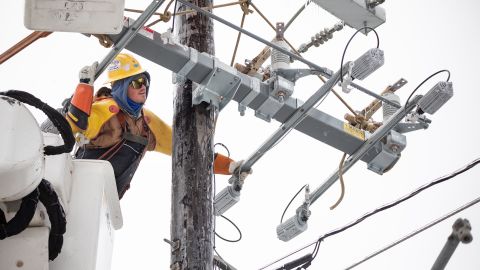 A worker repairs a power line in Austin, Texas, in February.