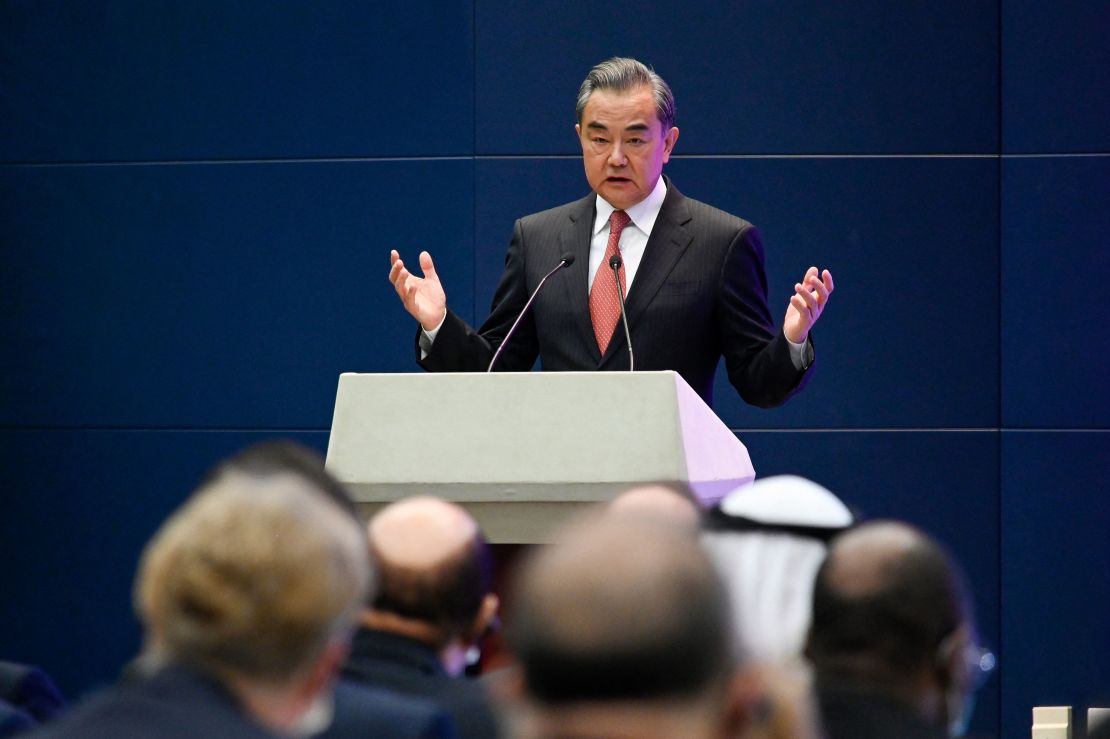China's Foreign Minister Wang Yi speaks at a promotional event in Beijing on April 12, 2021.