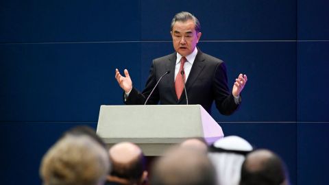 China's Foreign Minister Wang Yi speaks at a promotional event in Beijing on April 12, 2021.
