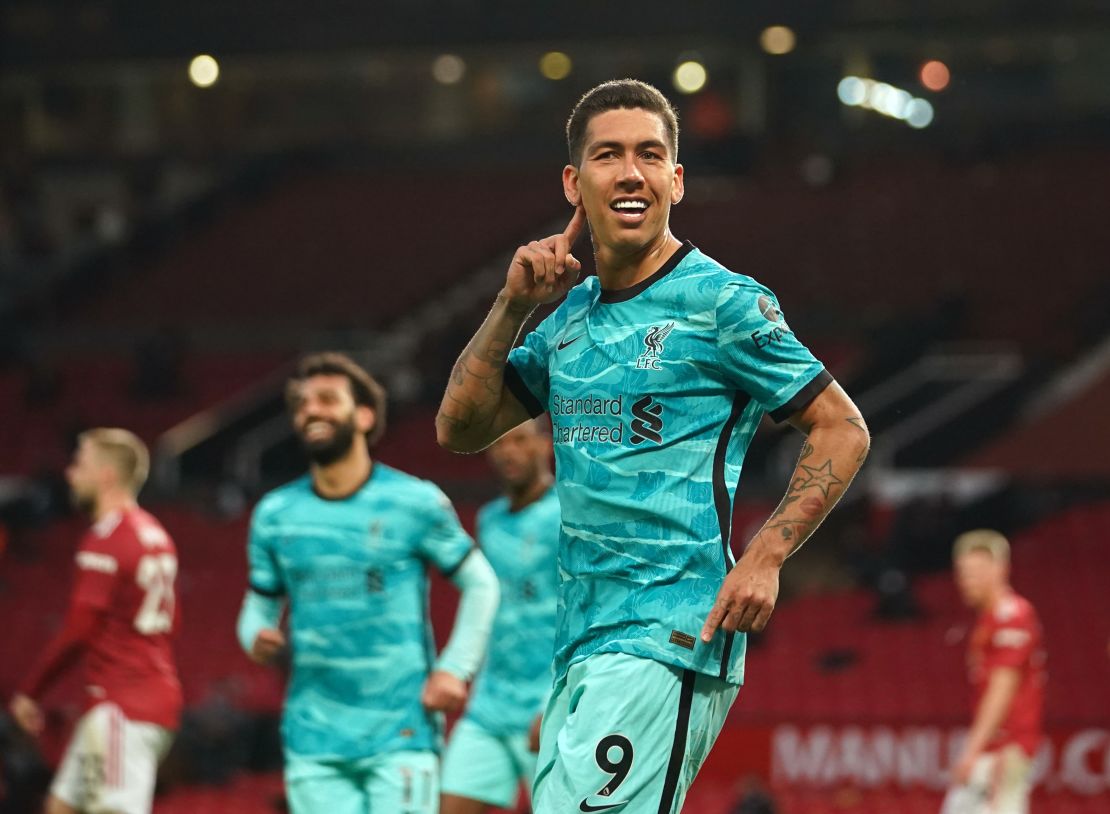 Firmino celebrates after scoring his side's second goal against Manchester United.