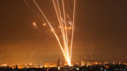 Rockets light up the night sky as they are fired towards Israel from Beit Lahia in Gaza Strip on May 14.