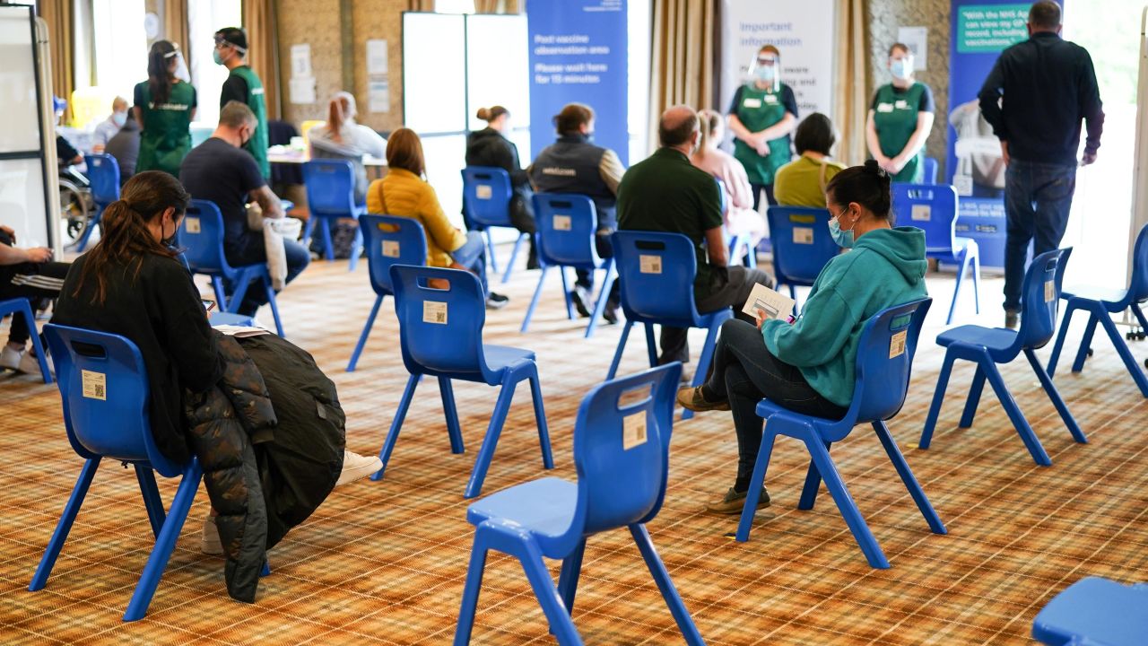 Patients wait in the observation area after receiving the Pfizer-BioNTech Covid-19 in Hexham, England.