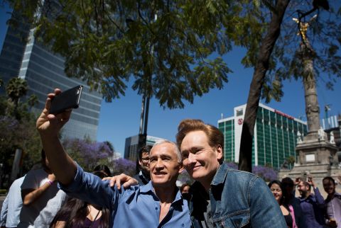 O'Brien poses for a photo with journalist Jorge Ramos as they walk in Mexico City in 2017. O'Brien taped an episode of his show in Mexico to "do something positive" after the tensing of US-Mexico relations.