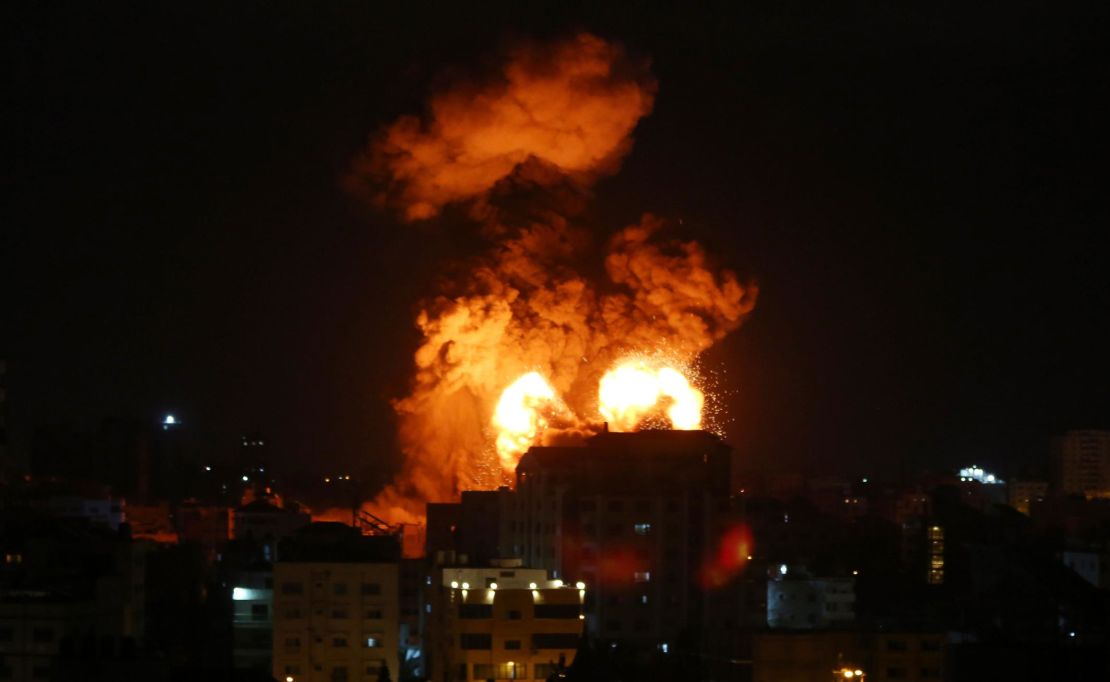 Smoke and flames rise after Israeli fighter jets conducted airstrikes in Gaza City, Gaza, on May 13.