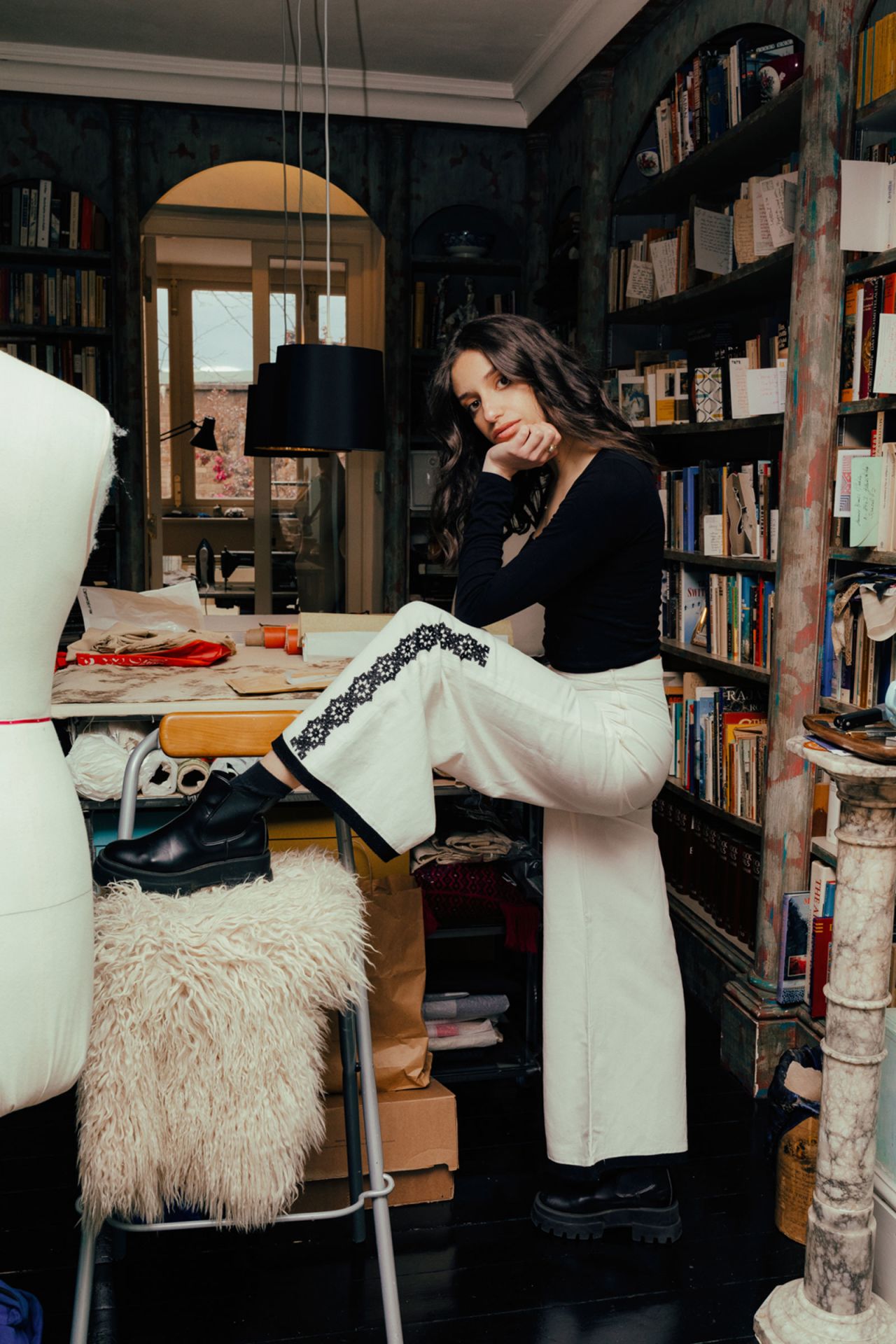 The artisans work with cotton, linen, silk or denim to create unique pieces, as modeled here.