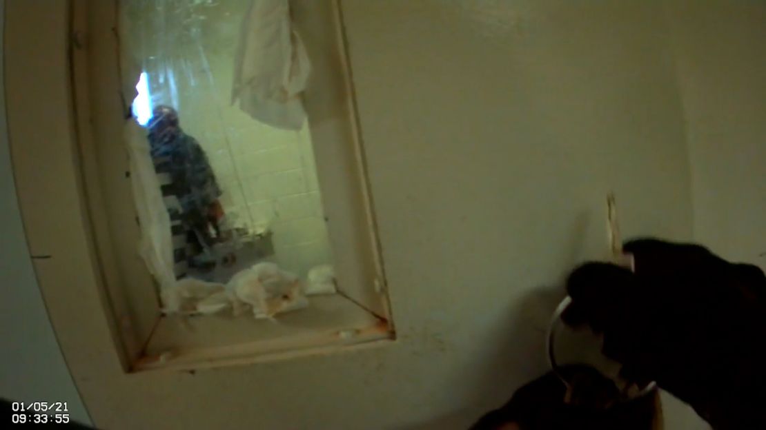 Jamal Sutherland is seen inside a cell at a detention center in North Charleston, South Carolina. The image was taken from a sheriff deputy's body camera footage.