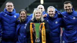 WATFORD, ENGLAND - MARCH 14: Emma Hayes, Head Coach of Chelsea Women's celebrates with the trophy and her backroom staff after her teams victory during the FA Women's Continental Tyres League Cup Final match between Bristol City Women and Chelsea Women at Vicarage Road on March 14, 2021 in Watford, England. Sporting stadiums around the UK remain under strict restrictions due to the Coronavirus Pandemic as Government social distancing laws prohibit fans inside venues resulting in games being played behind closed doors. (Photo by Naomi Baker/Getty Images)