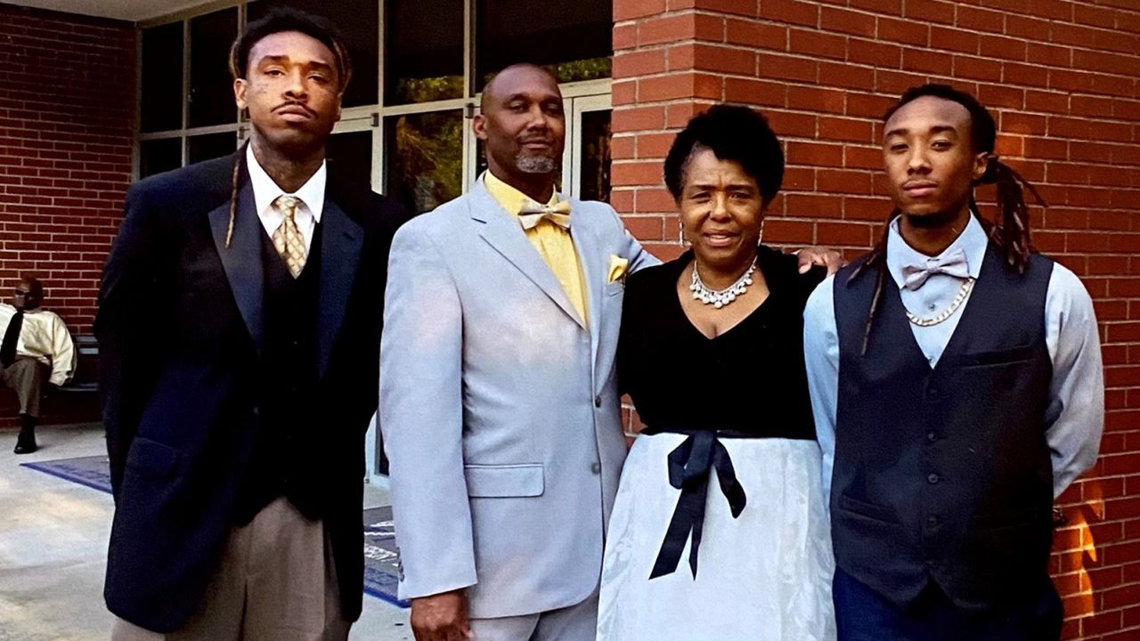 Jamal Sutherland, left, is seen in a family photo. 
