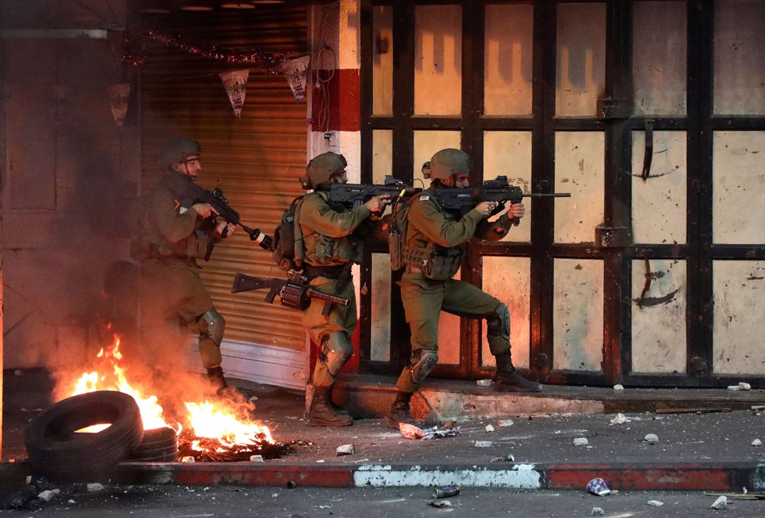 Israeli soldiers operate during clashes with Palestinian protesters in the city of Hebron, West Bank, on May 14.