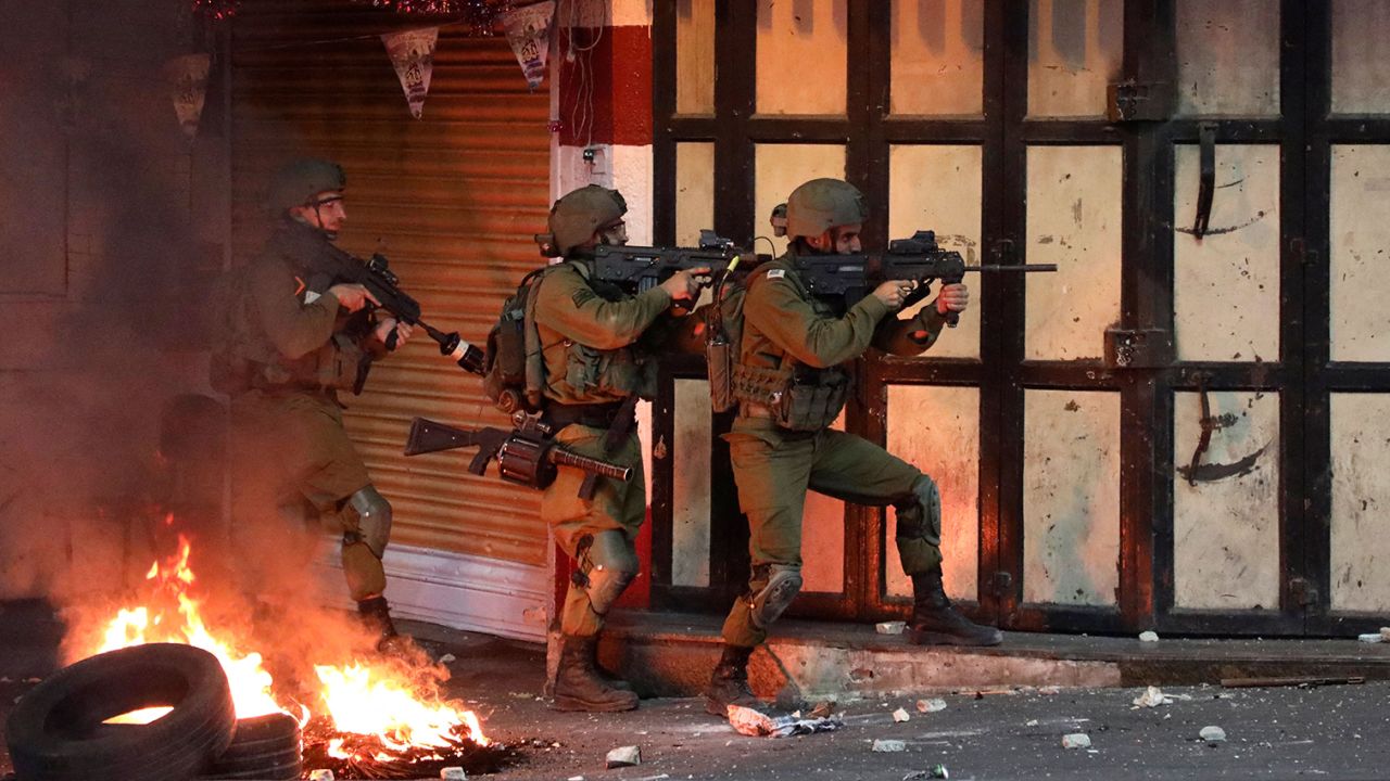 Israeli soldiers operate during clashes with Palestinian protesters in the city of Hebron, West Bank, on May 14.