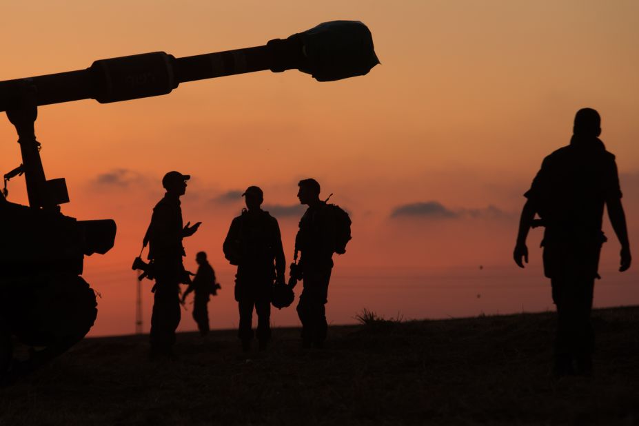 Israeli soldiers prepare an artillery unit in Sderot, Israel, near the border with Gaza on May 14.