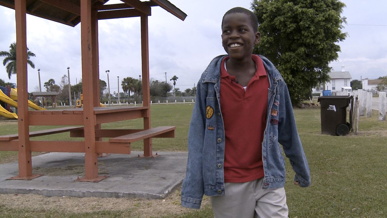 Damon Weaver walked in a park near his home in Pahokee, Florida, on January 13, 2009, when he was 10.