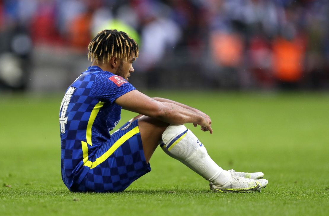 Reece James sits downcast on the pitch after Chelsea's defeat in Saturday's FA Cup final.
