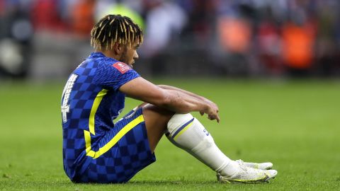 Reece James sits downcast on the pitch after Chelsea's defeat in Saturday's FA Cup final. 