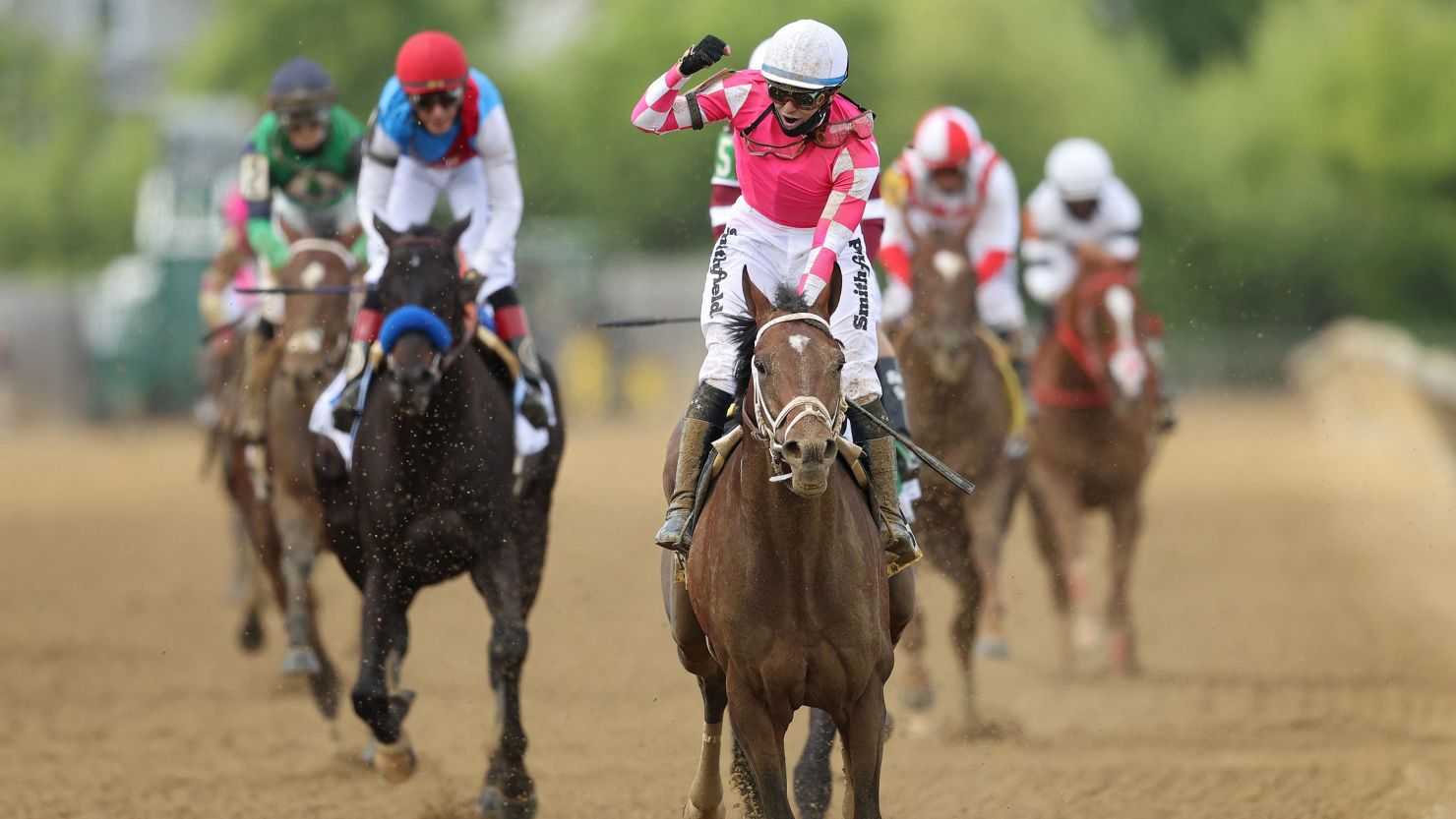 Jockey Flavien Prat riding Rombauer celebrates as he wins the 146th running of the Preakness Stakes on Saturday, May 15, in Baltimore, Maryland. 