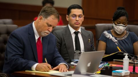 Attorney Michael Elliott andVictor Hugo Cuevas attend the bond revocation hearing on a separate murder charge at Fort Bend County Justice Center on Friday, May 14, 2021, in Richmond, Texas