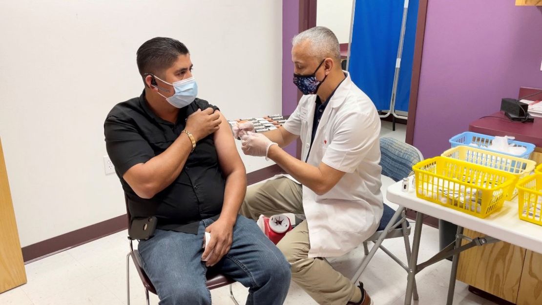 Frank Arredondo immunizing a patient.