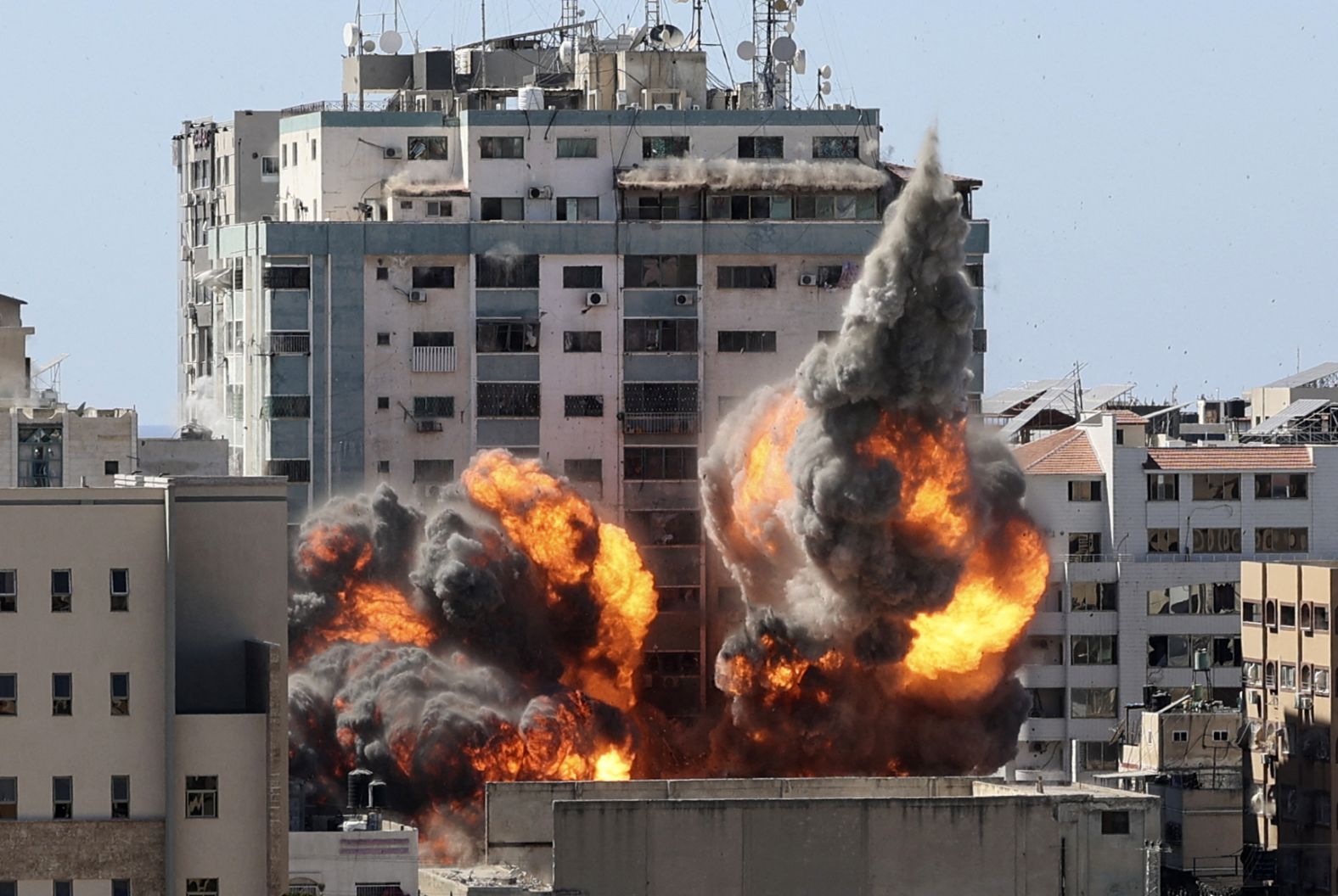 A ball of fire erupts from the Jala'a Tower, which houses the Associated Press, Al Jazeera and other media offices, as it is <a href="https://www.cnn.com/2021/05/15/media/associated-press-al-jazeera-gaza-bombings/index.html" target="_blank">destroyed by an Israeli airstrike</a> in Gaza City on Saturday, May 15.