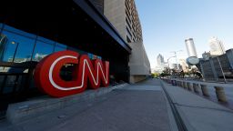 ATLANTA, GEORGIA - APRIL 04: A view of an empty sidewalk is seen outside of the CNN Center and the sign many tourists take pictures in front of on April 4, 2020 in Atlanta, Georgia. Georgia Gov. Brian Kemp issued a statewide shelter-in-place order for all residents that went into effect at 6 p.m. on April 3, 2020, to help slow the spread of the coronavirus (COVID-19) outbreak. (Photo by Kevin C. Cox/Getty Images)