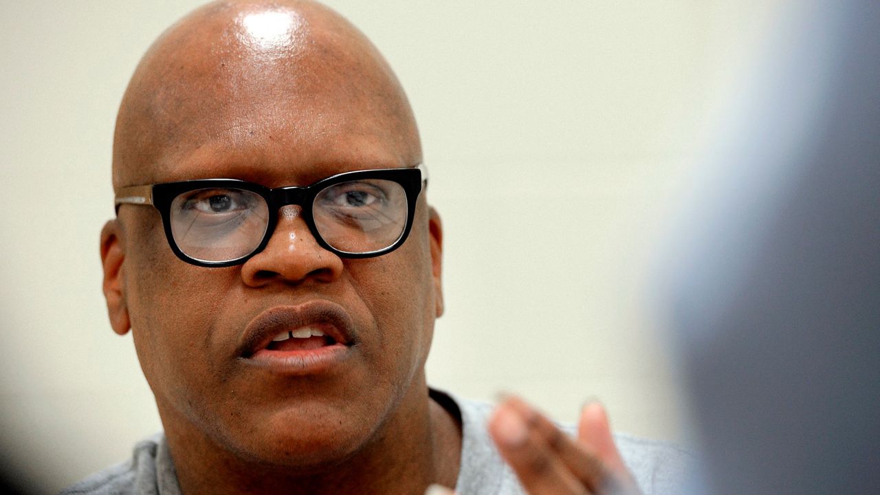 Leon Brown speaks with a reporter at the Maury Correctional Institution in Maury, North Carolina, in 2014.