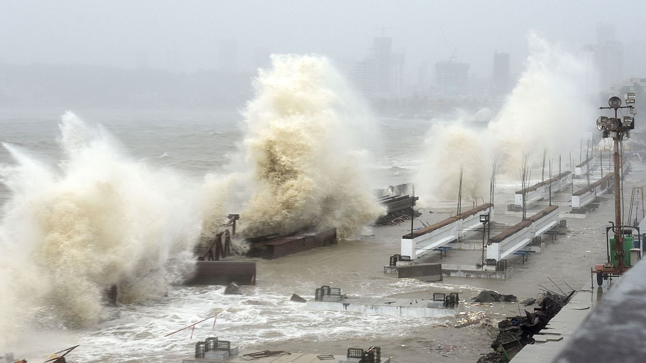 Waves lash over onto a shoreline in Mumbai on May 17 as Cyclone Tauktae bears down on India.