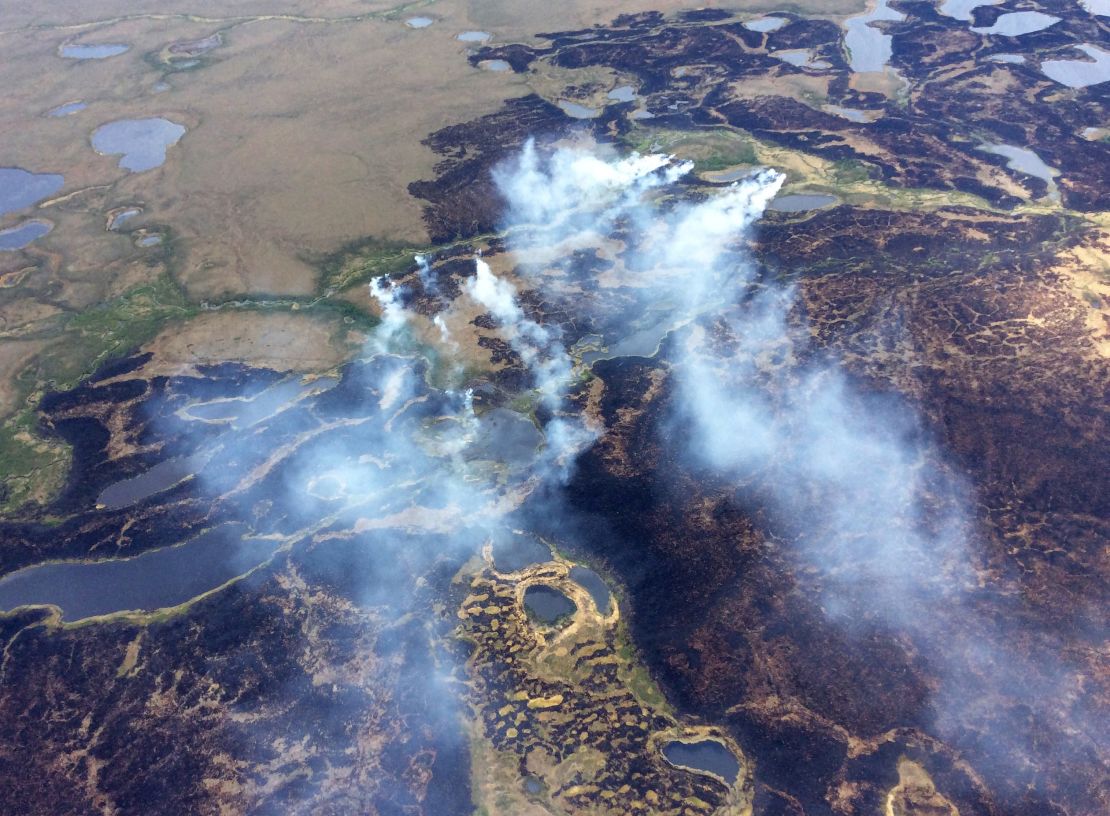 Smoke rises from a fire in Alaska's Yukon Delta National Wildlife Refuge in 2015. 