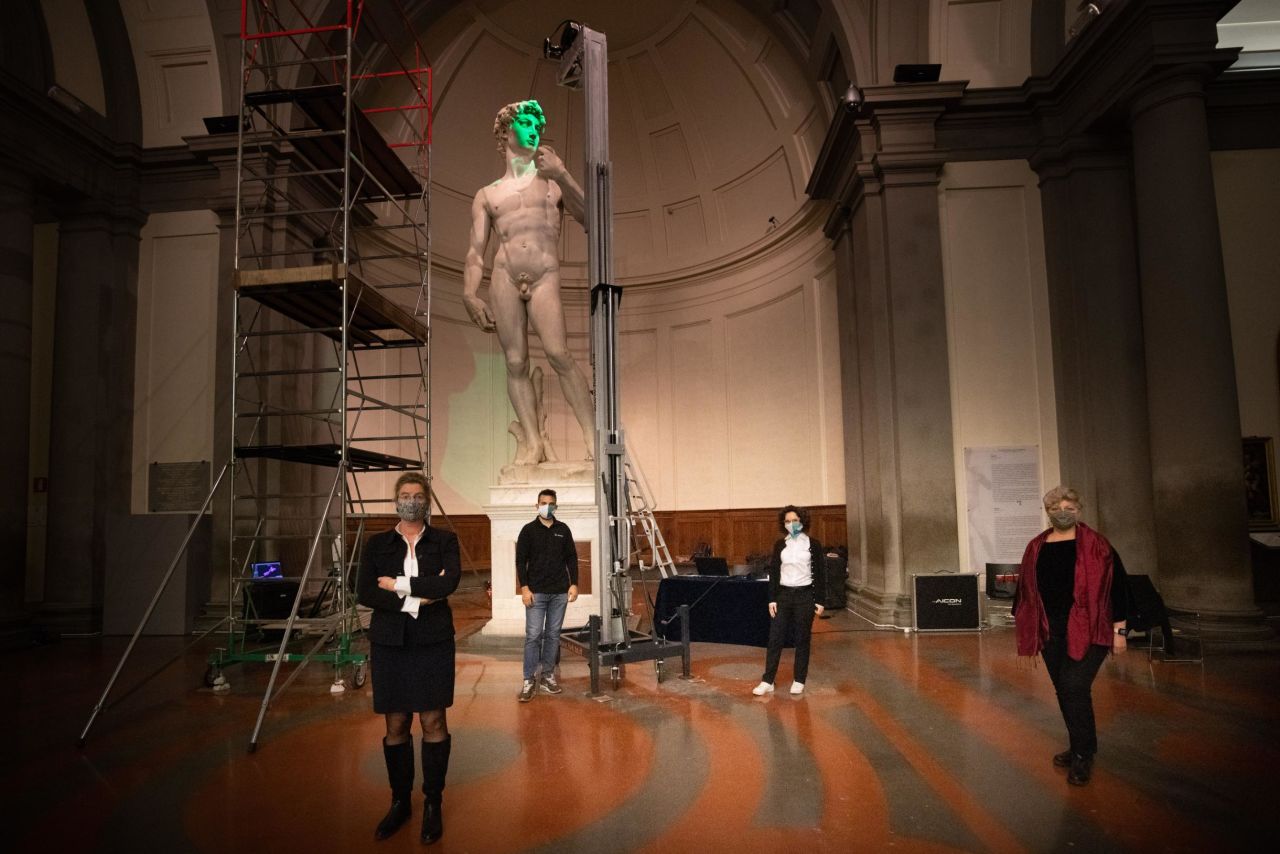 Cecilie Hollberg, director of the Galleria dell'Accademia of Florence (left) and a team from the school of engineering at the University of Florence led by Grazia Tucci (right) during the scanning of the original David.