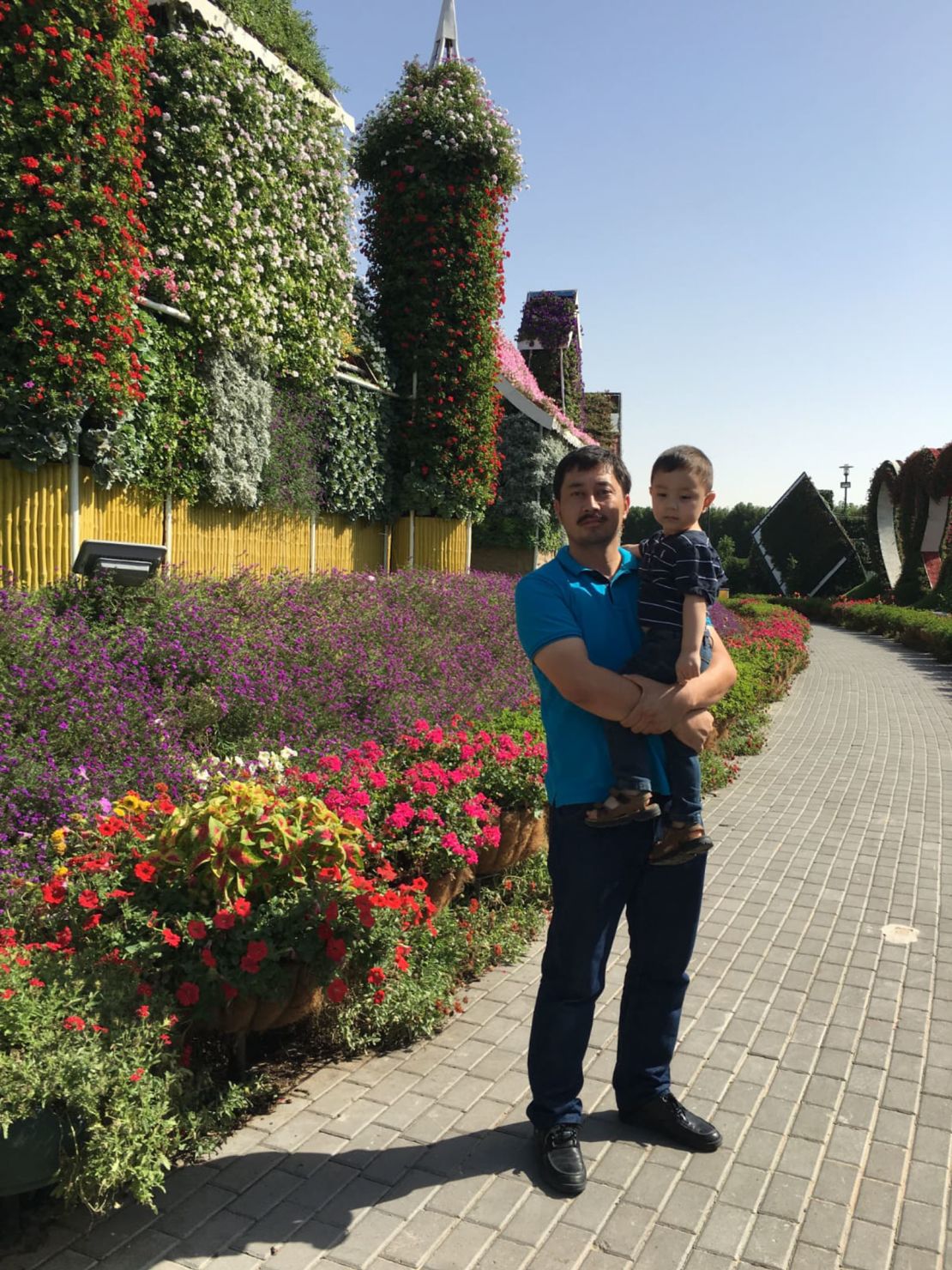 Amannisa Abdullah's husband Ahmad Talip and their son, Musa, in Dubai.