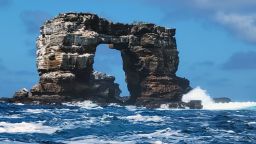 This photo distributed by Galapagos National Park shows Darwin's Arch off the Galapagos Islands, Ecuador, Sunday, May 16, 2021. Ecuador's Environment Ministry reported the collapse of the top of the arch on its Facebook page on Monday, May 17, and blame natural erosion of the stone. (Galapagos National Park via AP)