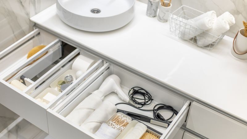 how to store bath towels under sink