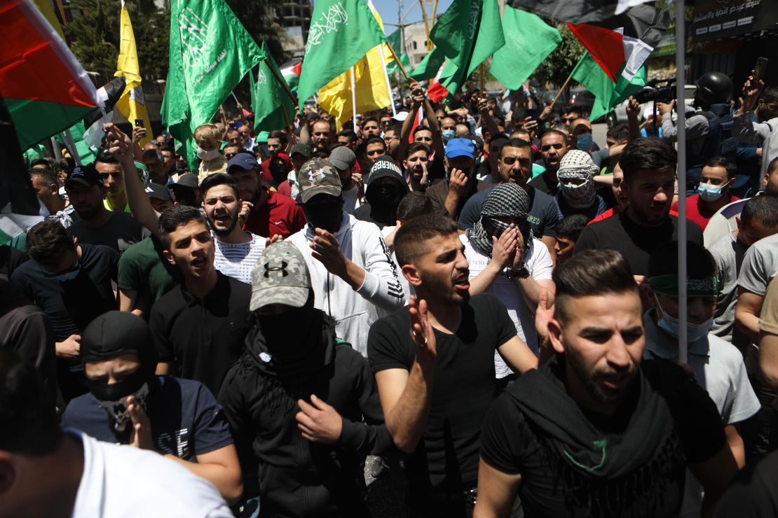 Palestinians protest against Israeli attacks in Hebron, West Bank on May 18.