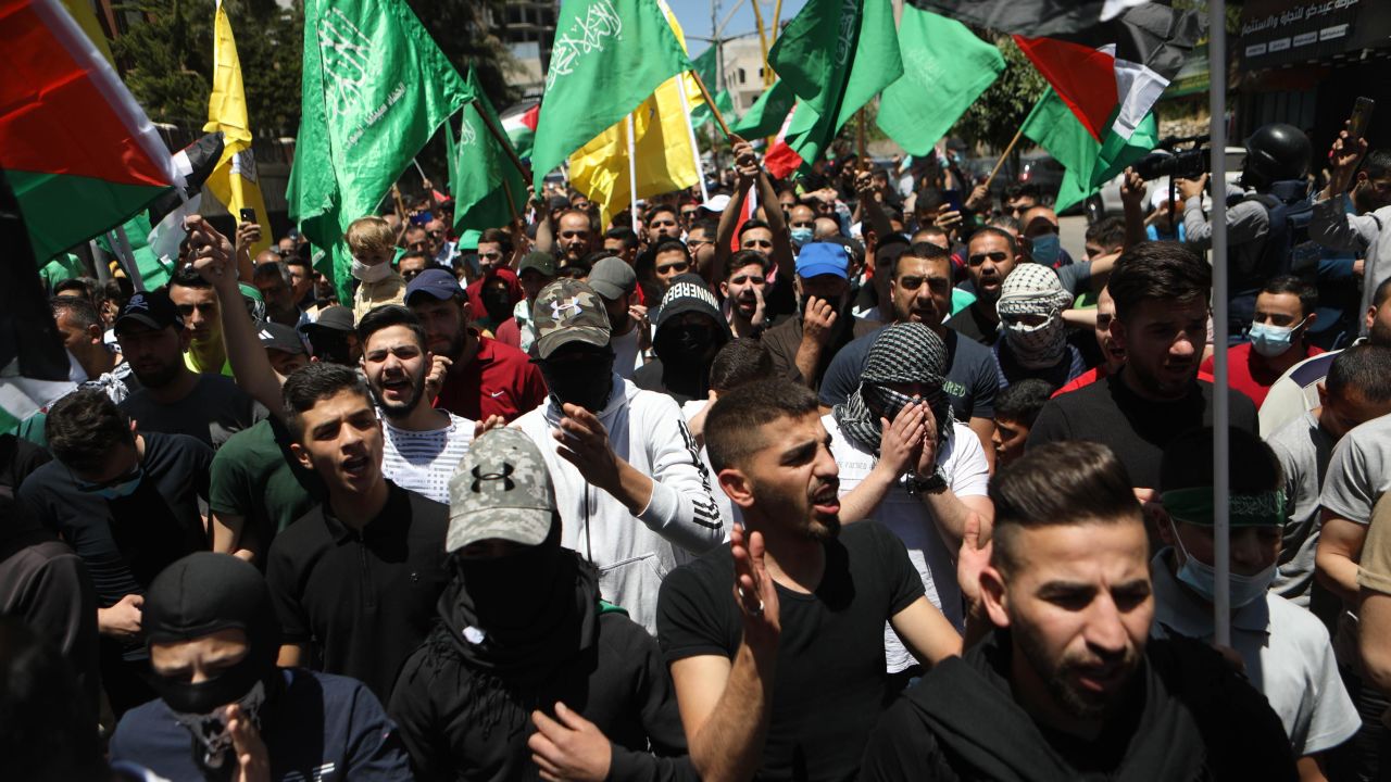 Palestinians protest against Israeli attacks in Hebron, West Bank on May 18.