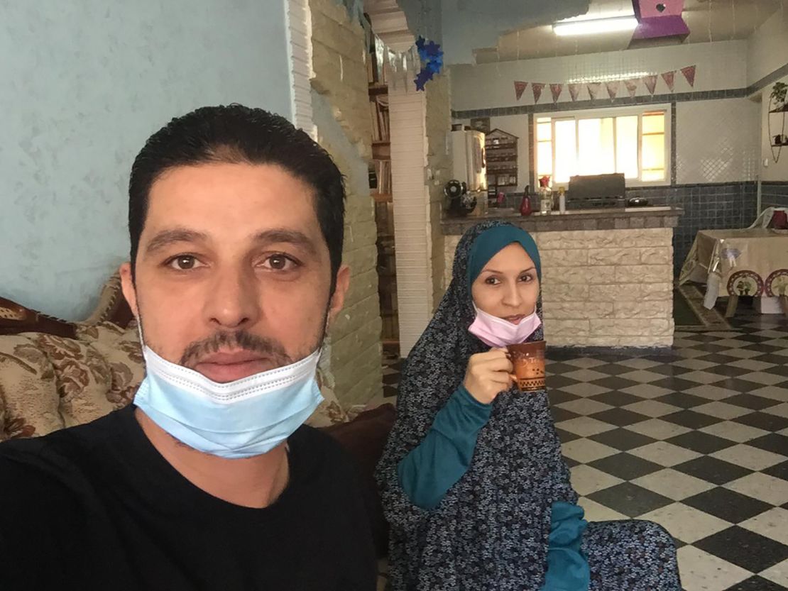 Musa Abu Askar, left, and Rasha Abu Askar in their home in Gaza. Both tested positive for the coronavirus just before violence flared. 