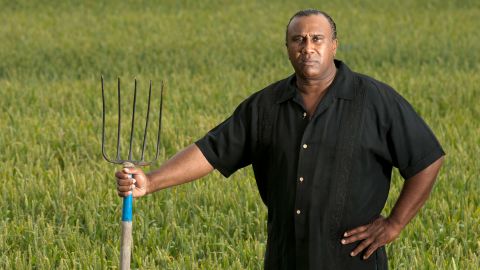 John Wesley Boyd Jr., president of the National Black Farmers Association, poses for a portrait at his farm on Wednesday May 9, 2012, in Baskerville, Virginia. 