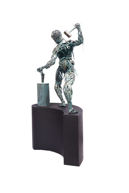 "OJO-OGUN" Blacksmith (2021) by Steve Ekpenisi. This sculpture speaks to the long history of iron smelting in West Africa, which is believed to have started in the sixth century BC.  