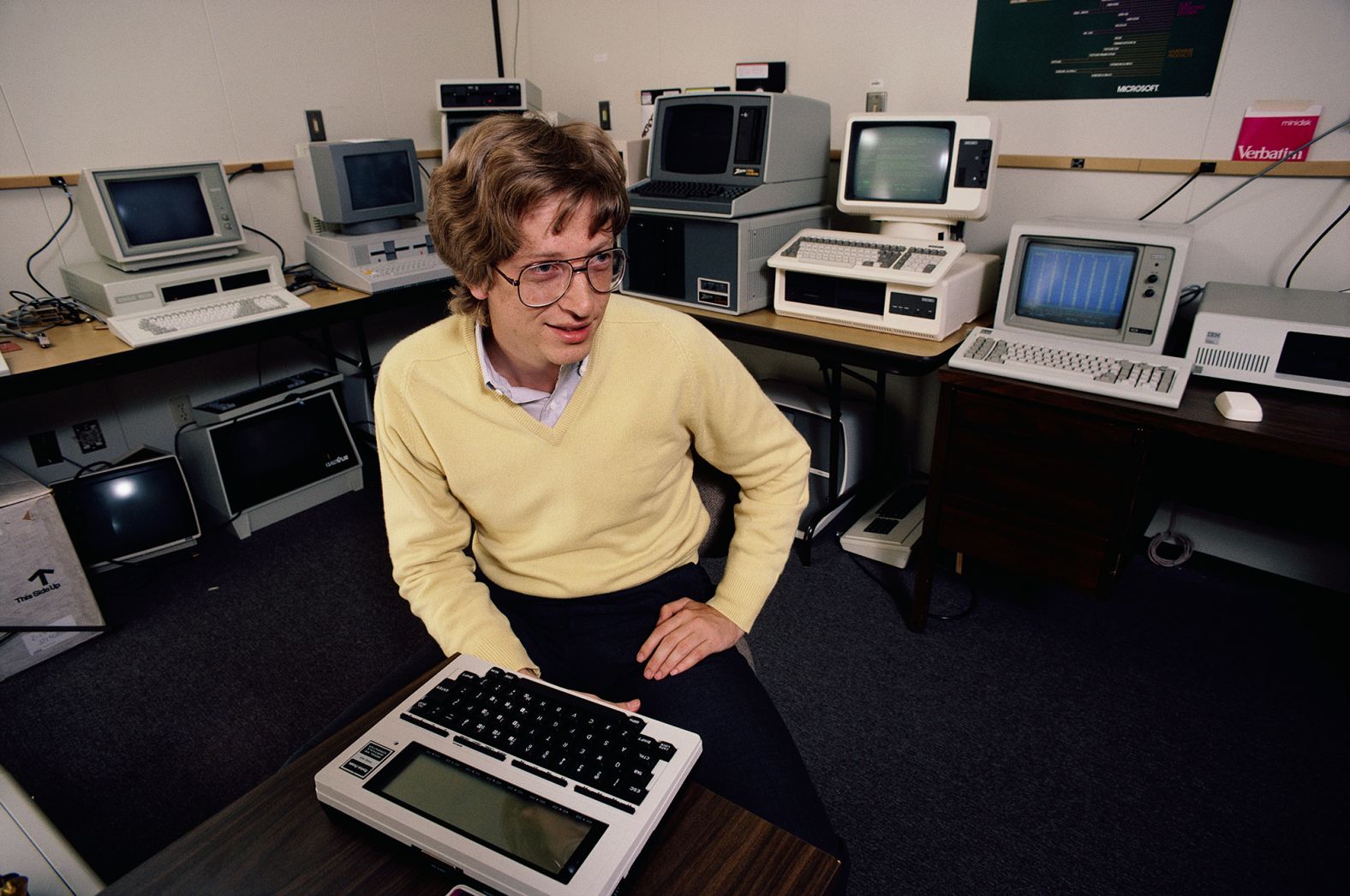 Gates, seen here in 1983, began programming computers at age 13. He dropped out of Harvard in 1975 and co-founded Microsoft with Paul Allen.