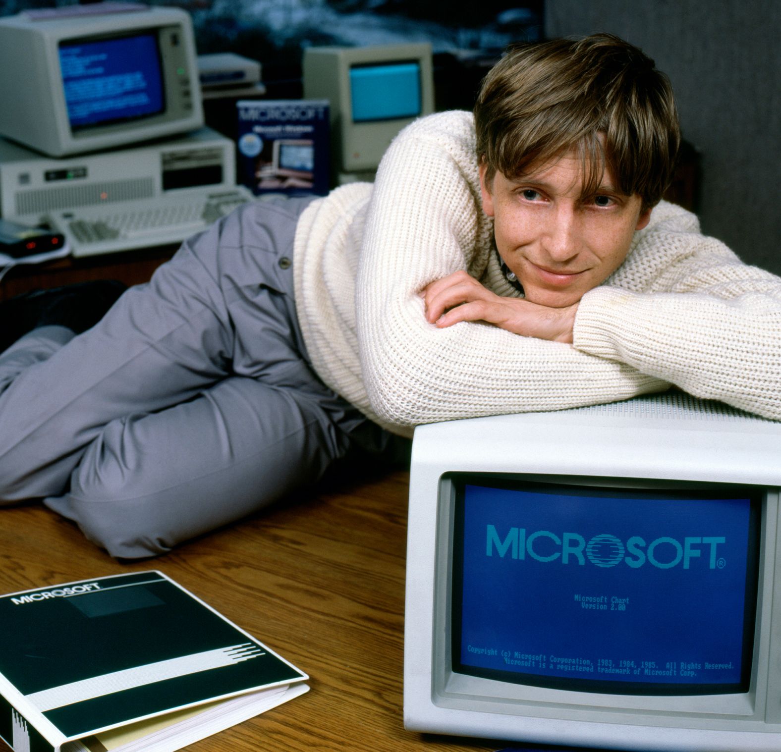 Gates leans on a monitor in Bellevue in 1985. That year, he introduced the Microsoft Windows operating system to compete with Apple. By 1987, the 31-year-old had become the youngest US billionaire.