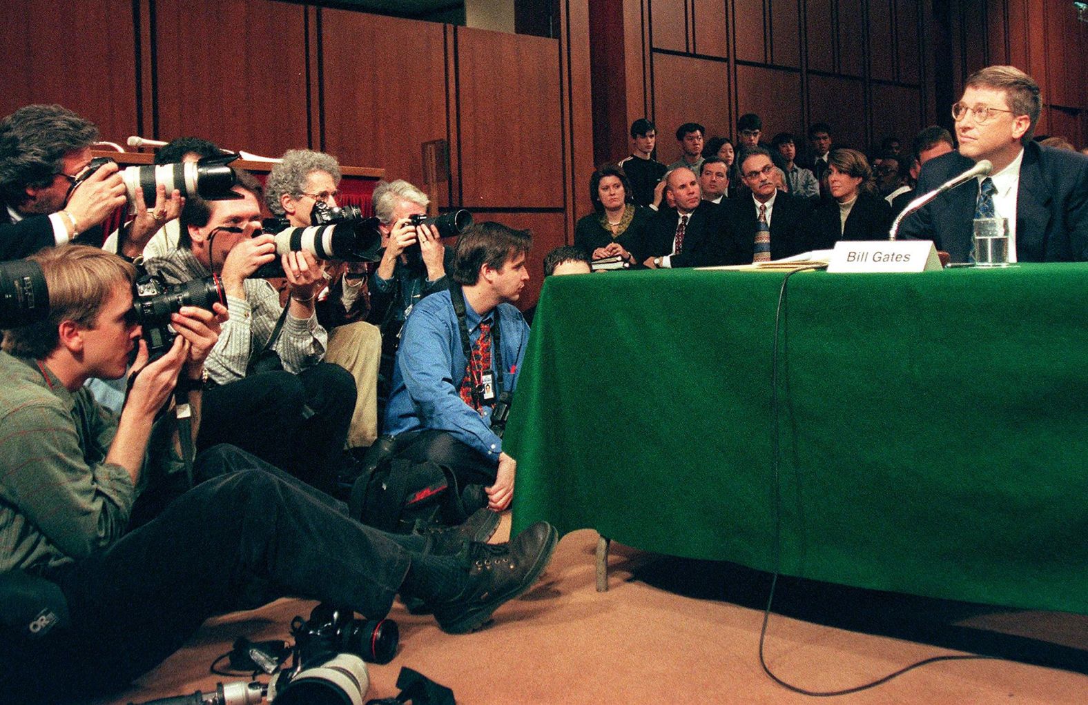 Photographers focus on Gates as he testifies before the US Senate Judiciary Committee in 1998. That year, the US Department of Justice, 20 states and the District of Columbia all filed lawsuits accusing Microsoft of using illegal, anti-competitive and exclusionary practices. In 2001, Microsoft <a href="https://money.cnn.com/2001/11/01/news/microsoft_chronology/" target="_blank">reached a settlement with the Justice Department</a>.