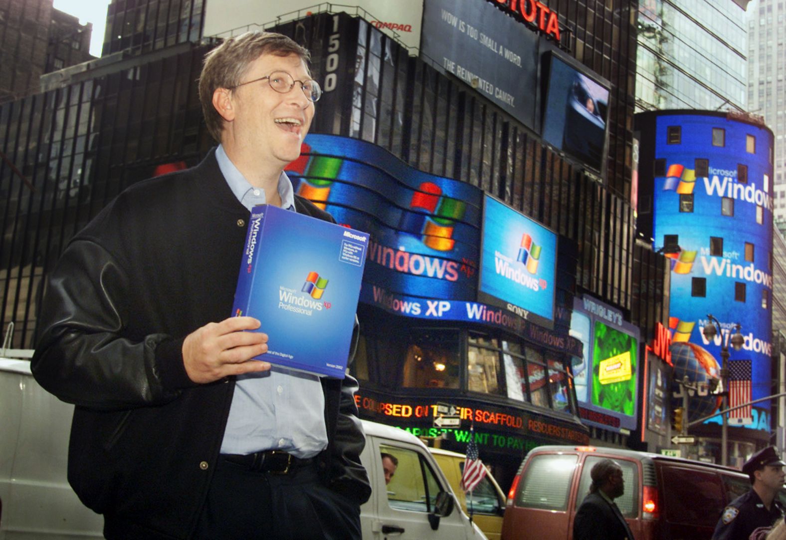 Gates stands in New York's Times Square to promote the new Windows XP operating system in 2001.