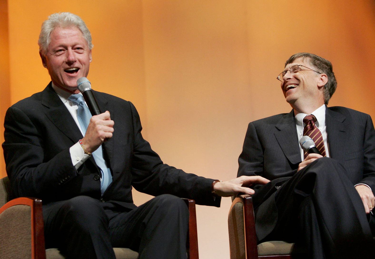 Gates laughs with former US President Bill Clinton at a Time Magazine Global Health Summit in New York in 2005. That year, Gates was named <a href="https://content.time.com/time/specials/packages/0,28757,2016788,00.html" target="_blank" target="_blank">Time's "Person of the Year"</a> along with his wife, Melinda, and musician Bono.
