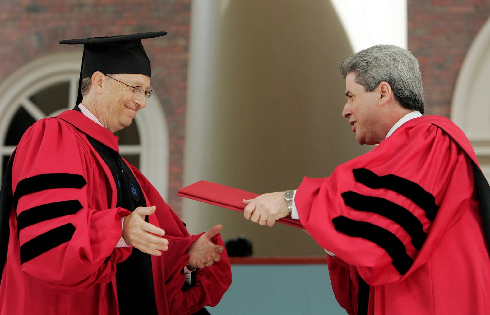 Gates receives an honorary degree at Harvard in 2007. He also delivered the commencement address at the school, which he dropped out of in 1975.