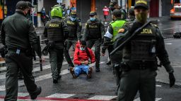 A man is arrested during clashes with the police following a protest against a tax reform bill launched by Colombian President Ivan Duque in Medellin, Colombia on April 29, 2021.
