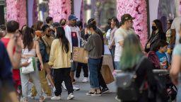People congregate in front of the decorations during the Macy's Flower Show at Macy's Herald Square amid the coronavirus pandemic on May 02, 2021 in New York City. 
