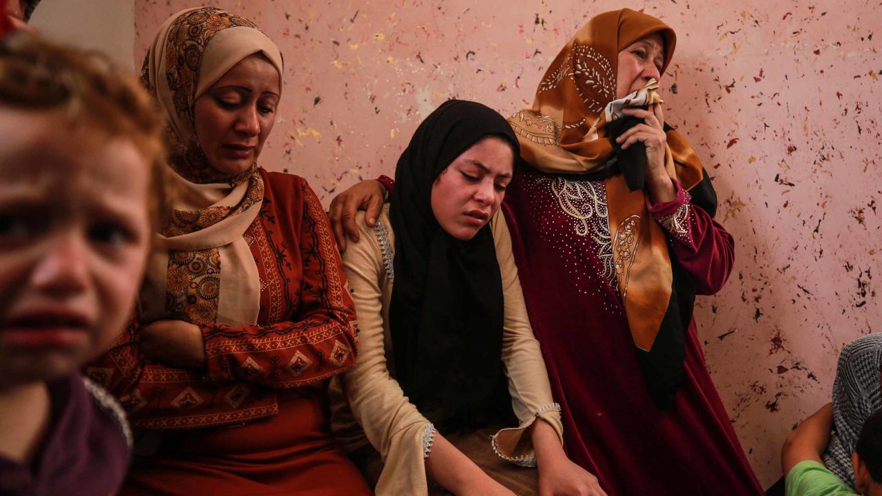 Relatives of 11-year-old Deema Asaliyeh, who was killed in an Israeli strike, mourn during her funeral ceremony at Jabalia refugee camp in Beit Lahia, Gaza on Thursday. 