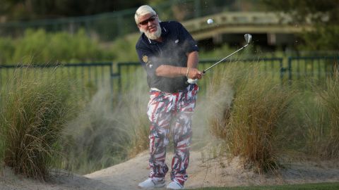 Daly plays his shot on the first hole out of the sand during the first round of the 2021 PGA Championship.