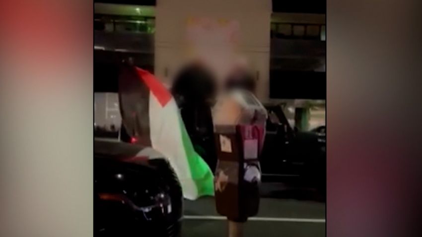 People waving Palestinian flags were involved in the altercation outside the Los Angeles restaurant.