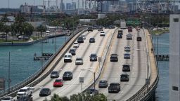 Vehicle traffic is seen in the street as people prepare for the Memorial Day weekend on May 27, 2016 in Miami Beach, Florida. 